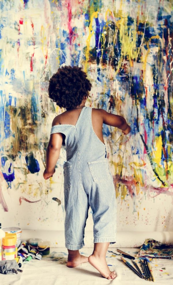 black-kid-enjoying-his-painting-e1614735124832